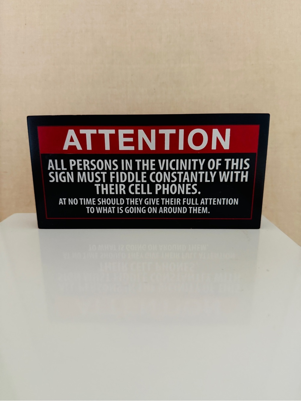 Our Name Is Mud Sarcastic and parodying official warning notices.